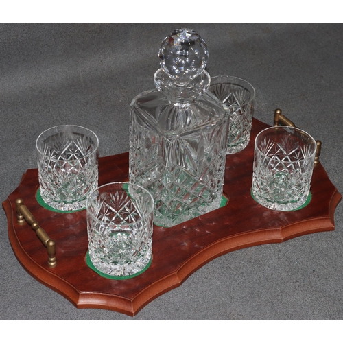 115 - A Mappin & Webb cut glass decanter with stopper and 4 matching tumblers, with rectangular scallop sh... 