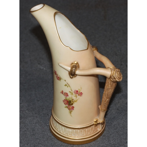 118 - A Royal Worcester Blush round jug with horn shaped handle and multi-coloured floral, leaf and gilt d... 