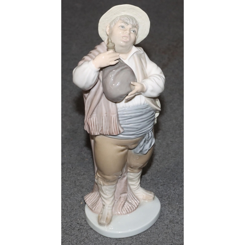 134 - A Lladro figure of a standing gentleman holding a water bottle, 21cm high