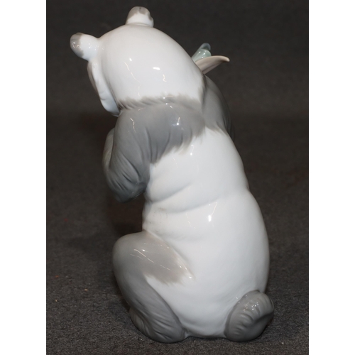 136 - A Nao figure of a seated panda, 16.5cm high