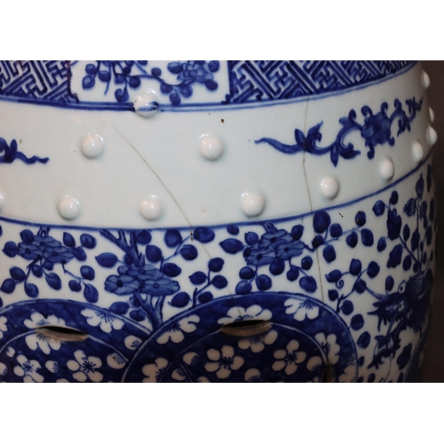 147 - A Chinese 19th Century round bulbous blue and white garden  seat with allover dragon, leaf and scrol... 