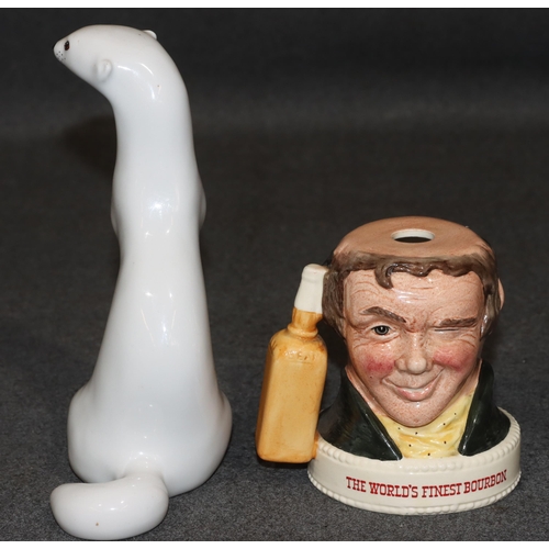 148 - A USSR Lomonosov china figure of a stout, 18cm high and a Royal Doulton double-faced Jim Bean Bourbo... 