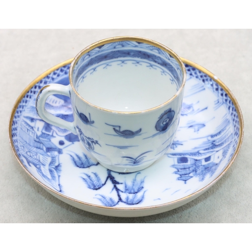 152 - An 18th Century Chinese blue and white cup and saucer with figure, river landscape and building deco... 