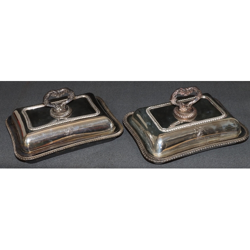 318 - A pair of silver plated rectangular entrée dishes with covers and gadroon rims, 29cm wide