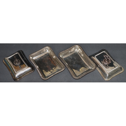 318 - A pair of silver plated rectangular entrée dishes with covers and gadroon rims, 29cm wide