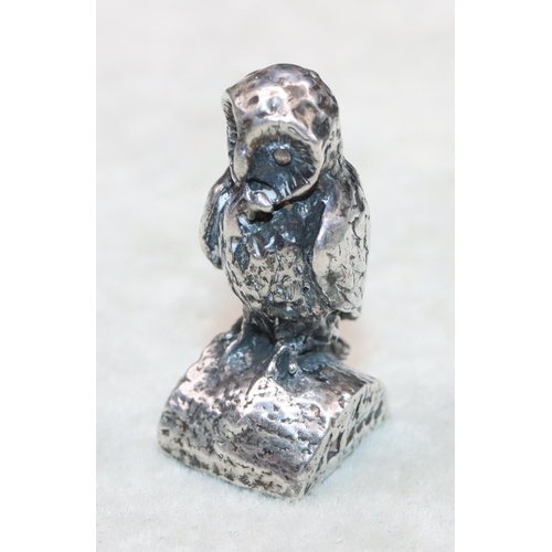 329 - A small 925 silver model, 3.1cm high, 0.87oz