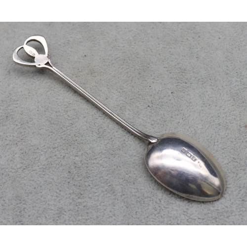 333 - An Edward VII James Fenton for Liberty & Co. silver and enamelled teaspoon with purple, green and tu... 