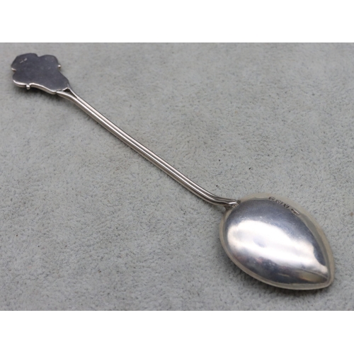 335 - An Edward VII James Fenton for Liberty & Co. silver and enamelled teaspoon with green, turquoise and... 