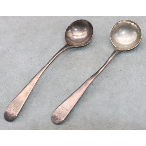 339 - A pair of George III silver mustard spoons with engraved crests, London 1807, 0.49oz (2)