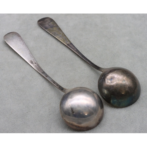 342 - A pair of Tostrup 830 silver coloured metal sauce ladles, dated 1884 with engraved handles, 1.8oz