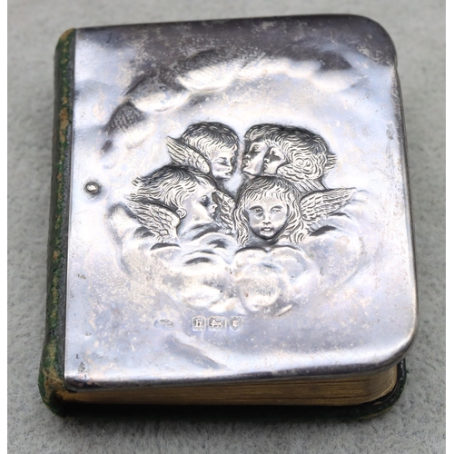 359 - An Edward VII small prayer book with embossed silver front, London 1903, embossed cupid head motifs