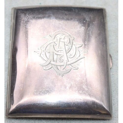 362 - An Edward VII small silver plain concave shaped cigarette case with hinged front engraved with monog... 