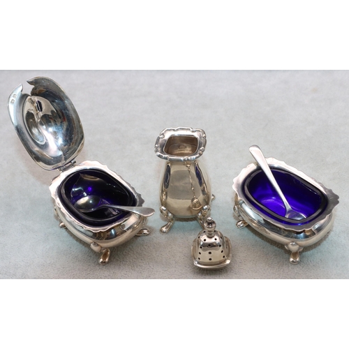 374 - A 3-piece Birmingham silver rectangular bulbous shaped condiment set comprising of mustard with blue... 