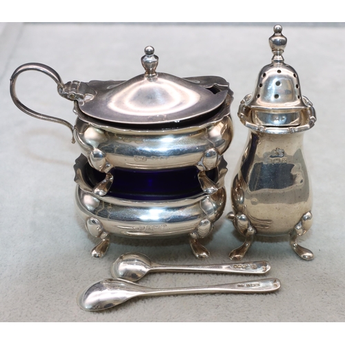 374 - A 3-piece Birmingham silver rectangular bulbous shaped condiment set comprising of mustard with blue... 