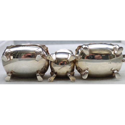 374 - A 3-piece Birmingham silver rectangular bulbous shaped condiment set comprising of mustard with blue... 