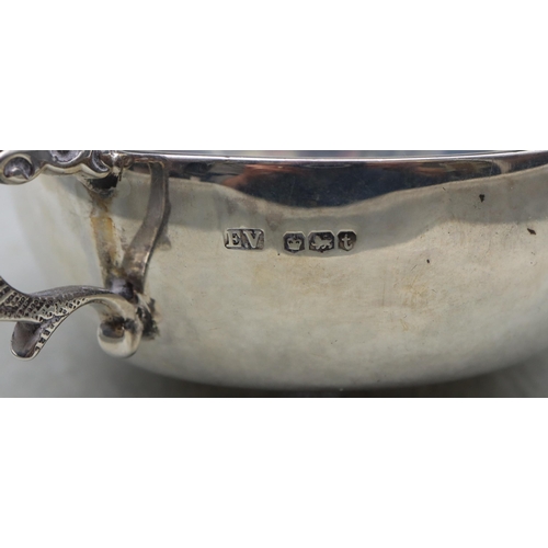 378 - A George V silver round 2-handled bleeding bowl, Sheffield 1936, maker E. Viner, 12cm wide, 2.3oz