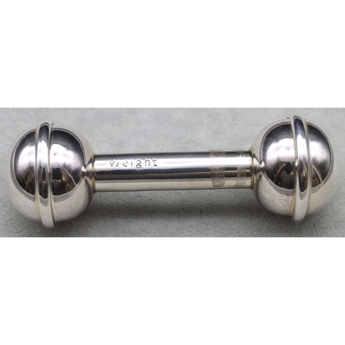 391 - A modern Birmingham 925 silver baby's rattle in the form of a dumb weight, 11cm long, 1oz