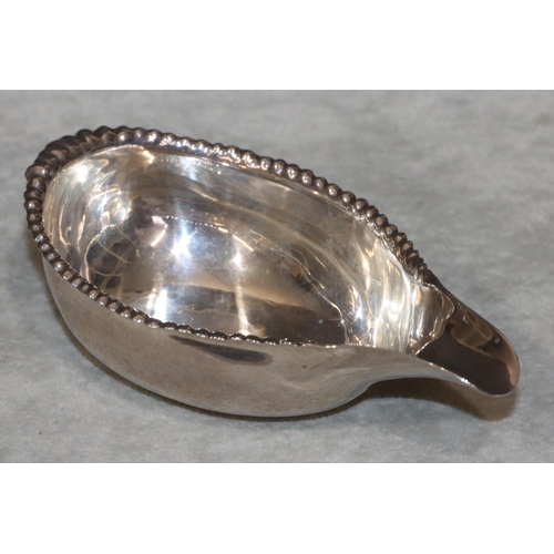 395 - An early George III silver Pap boat with embossed ball rim, London 1766 (marks rubbed), 1.5oz