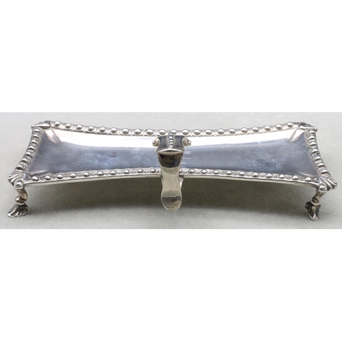 398 - An early George III silver rectangular shaped snuffer tray with raised ball rim and scroll handle on... 