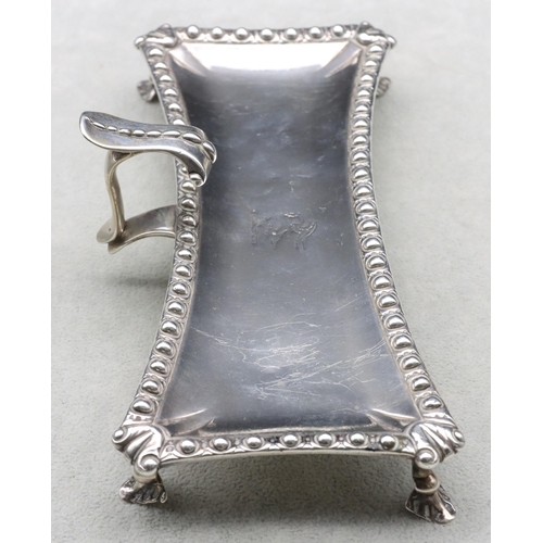 398 - An early George III silver rectangular shaped snuffer tray with raised ball rim and scroll handle on... 