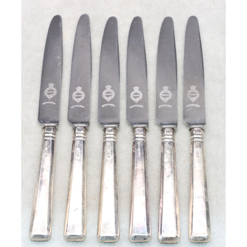 403 - A set of 6 Sheffield silver handled butter knives in fitted brown leather case