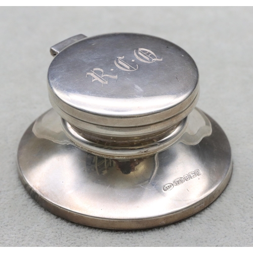 405 - A modern Birmingham 925 silver inkwell with hinged lid on round splayed base, 7.1cm diameter