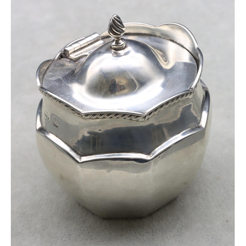 408 - A late Victorian silver small oval tea caddy with hinged lid and scallop shaped rim, Birmingham 1900... 