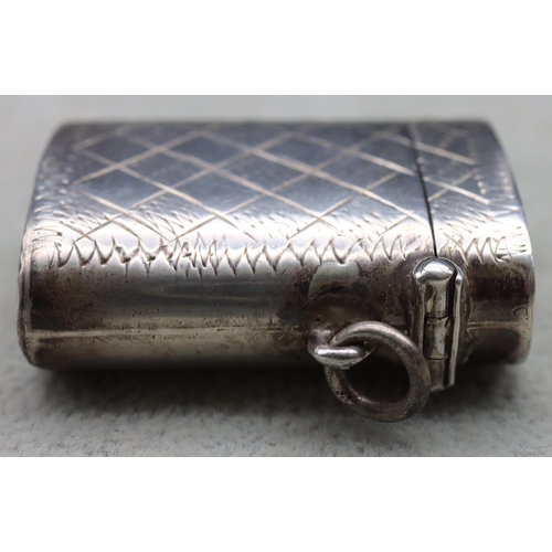 415 - A sterling silver vesta case with hinged lid, stamped 