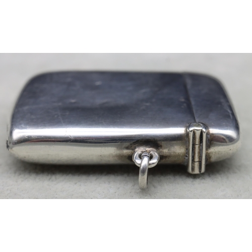 417 - A Chester silver vesta case with centre circular with National Rifle Association motif of 2 embossed... 