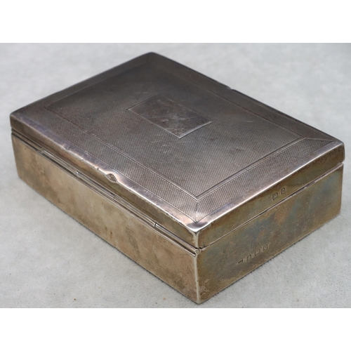 419 - A Birmingham silver rectangular shaped cigarette box with engine turned hinged lid enclosing cedar l... 