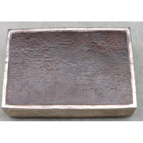 419 - A Birmingham silver rectangular shaped cigarette box with engine turned hinged lid enclosing cedar l... 