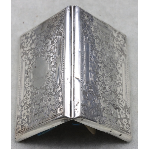 420 - A Victorian Birmingham silver card case with allover bright cut floral and scroll decoration, hinged... 