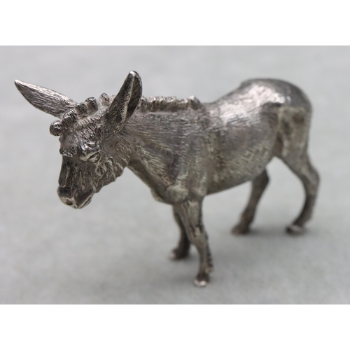 421 - A London cast silver model of a donkey, maker's mark S.M.D, 6cm high, 2.8oz