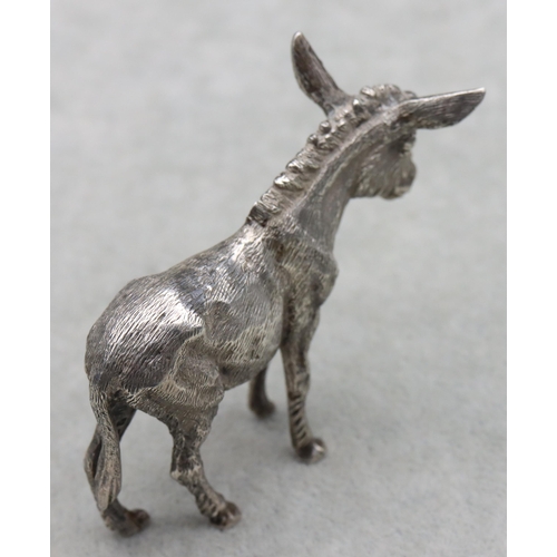 421 - A London cast silver model of a donkey, maker's mark S.M.D, 6cm high, 2.8oz