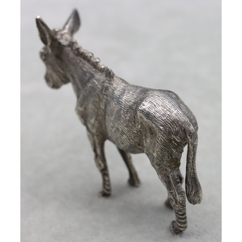 421 - A London cast silver model of a donkey, maker's mark S.M.D, 6cm high, 2.8oz