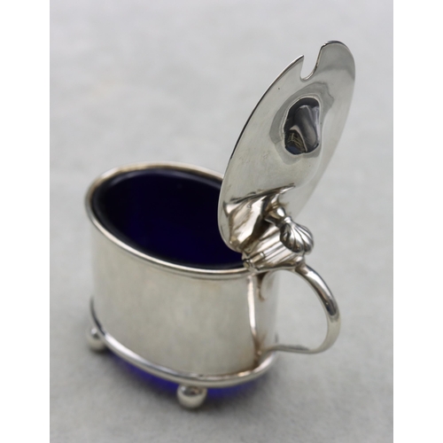 424 - A Victorian Birmingham silver oval mustard pot with hinged lid enclosing blue glass liner, 1.3oz