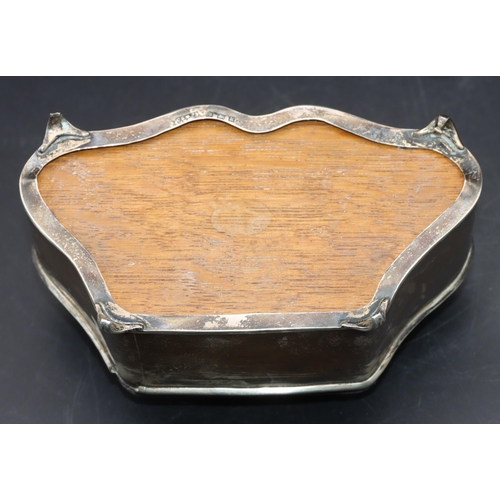 426 - An Edward VII silver scallop shaped trinket box with hinged pin cushion top enclosing part fitted in... 