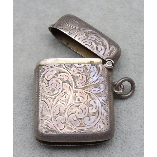 432 - An Edward VII silver vesta case with allover chased decoration and hinged lid, Birmingham 1903, 0.86... 