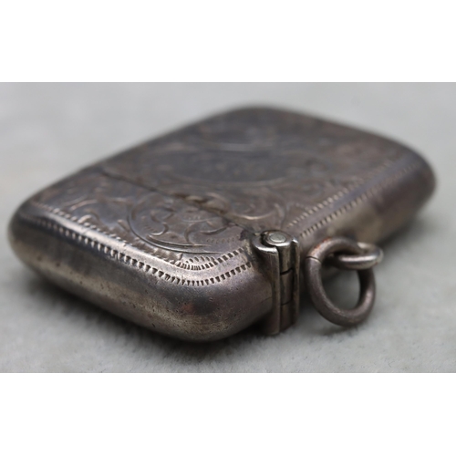 432 - An Edward VII silver vesta case with allover chased decoration and hinged lid, Birmingham 1903, 0.86... 