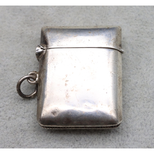 433 - A sterling silver plain vesta case with hinged lid