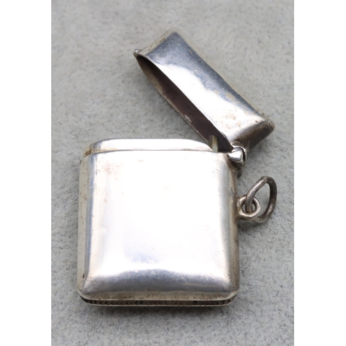 433 - A sterling silver plain vesta case with hinged lid