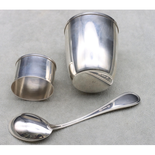 435 - A Continental 800 silver coloured metal beaker, napkin ring and child's spoon in fitted blue case, 2... 