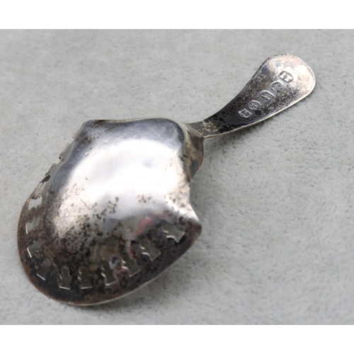 436 - A George III silver caddy spoon with pierced bowl and engraved Birmingham 1911, maker Joseph Taylor