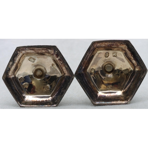 454 - A pair of modern London silver small candlesticks on turned stems with hexagonal splayed bases, make... 