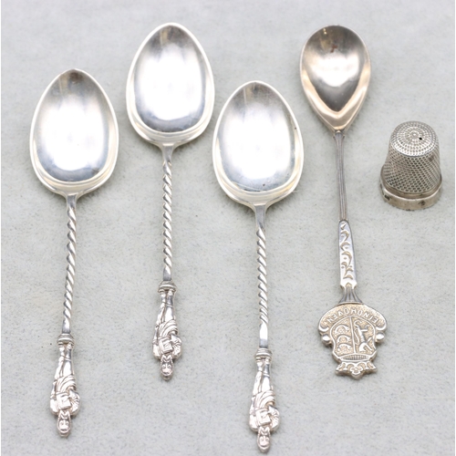 457 - A set of 3 Sheffield silver Apostle teaspoons with twist stems, a Continental silver coloured metal ... 