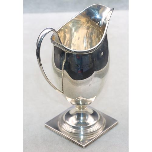 458 - An Edward VII silver cream jug on square base, London 1901, 13cm high, 3oz