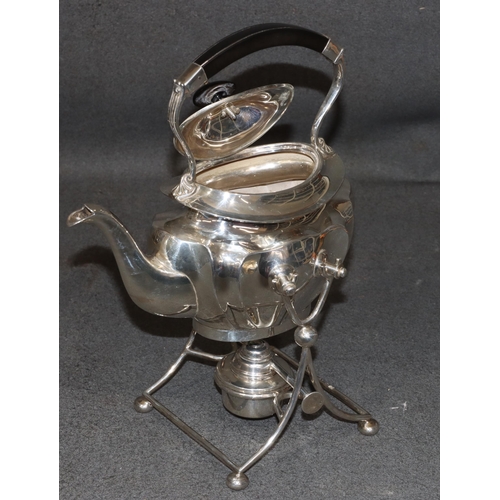 460 - A George V silver oval kettle on stand with matching burner, overhead ebony handle and finial, Sheff... 