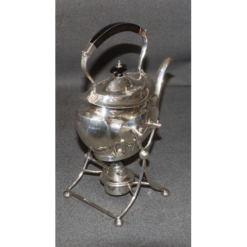 460 - A George V silver oval kettle on stand with matching burner, overhead ebony handle and finial, Sheff... 