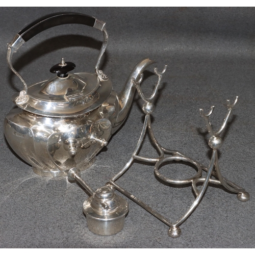 460 - A George V silver oval kettle on stand with matching burner, overhead ebony handle and finial, Sheff... 