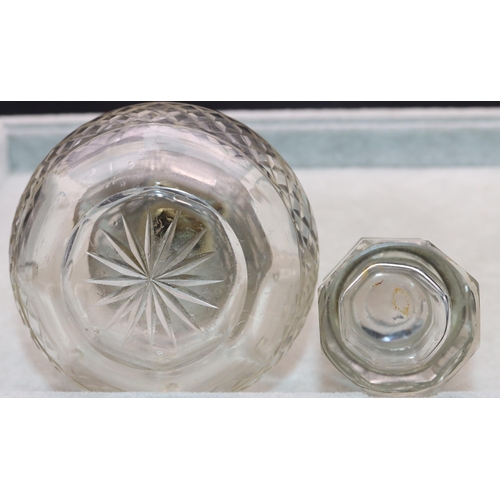 463 - A cut glass round bulbous shaped scent bottle with London silver neck and hinged lid (hinge a/f), en... 